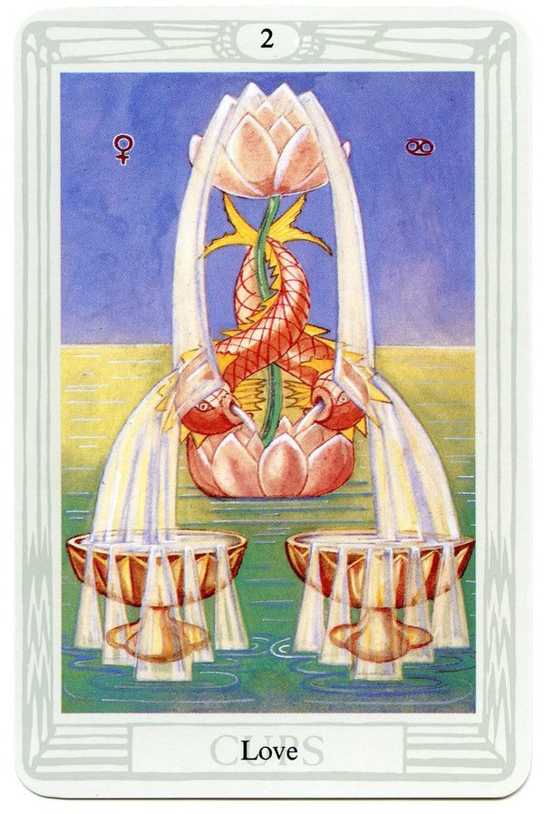 Two of Cups (Love), Thoth Tarot. Two cups overflow from a lotus on a calm sea; two dolphins twine around the stem and their streams cross. The card is an image of exchange.