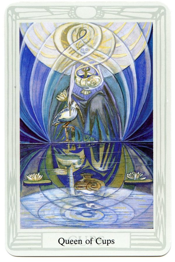 Queen of Cups, Thoth Tarot. A woman seated on still water, so veiled in light and reflection that her form can hardly be seen; she holds a shell-cup from which a crayfish emerges, an ibis stands beside her, and lotuses grow at her feet; her crest is an ibis.