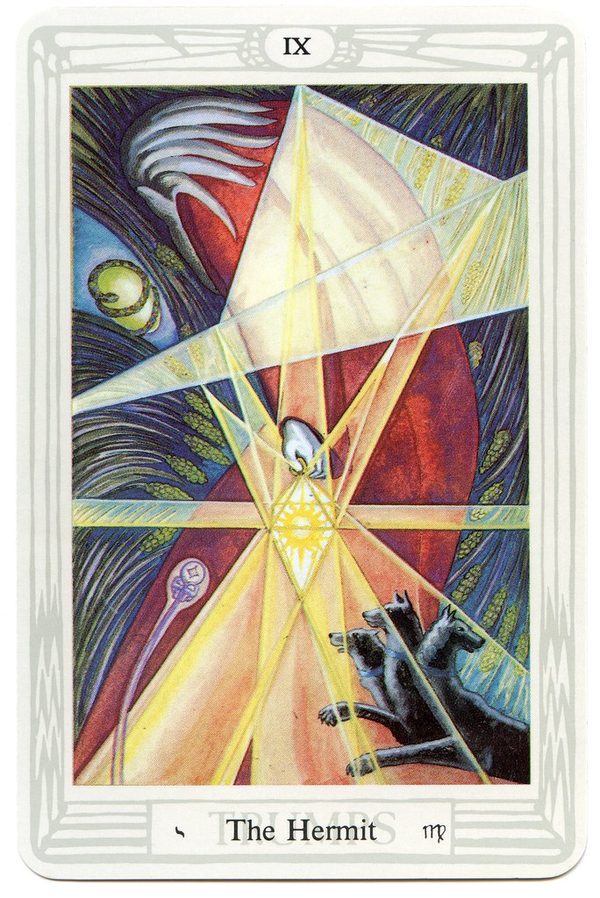 The Hermit, Thoth Tarot. A hooded old man, bent forward, holds a lamp within which shines a sun; his path is a field of wheat, and before him coil a serpent and the spermatozoon-like Orphic egg. Cerberus, the three-headed dog, follows at his heel.